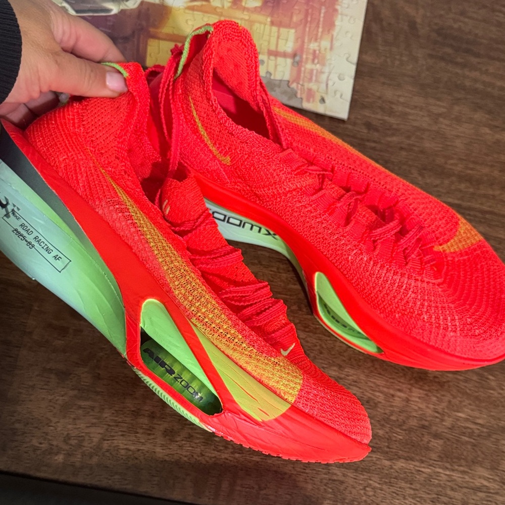 Nike ZoomX Red and Yellow Athletic Shoes